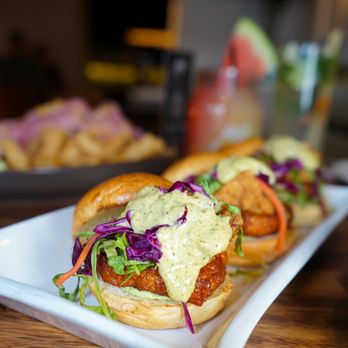 Mojo signature dishes Baja Shrimp TacosBeef EmpanadasMojo Burger